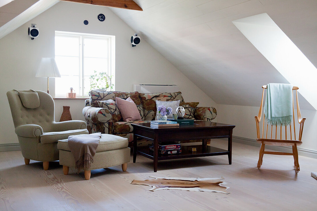 Old-fashioned furniture in attic living room