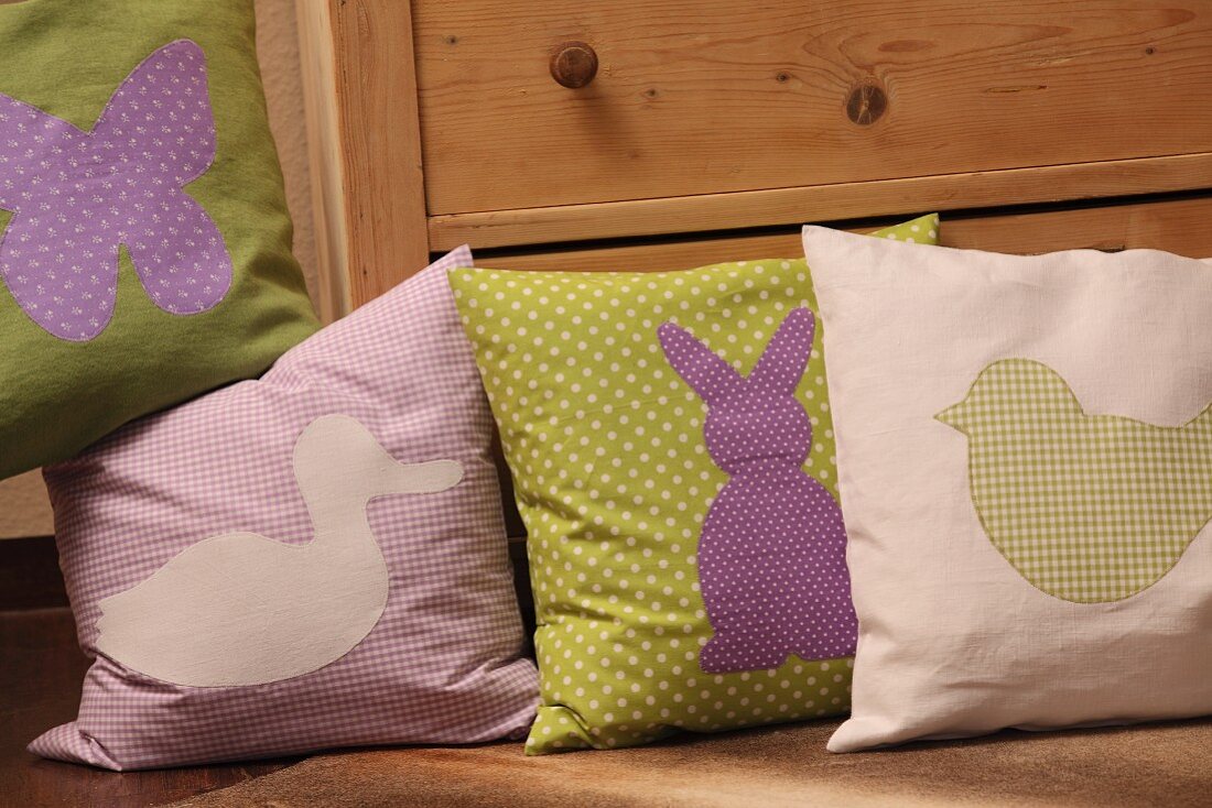 Hand-sewn scatter cushions with Easter motifs