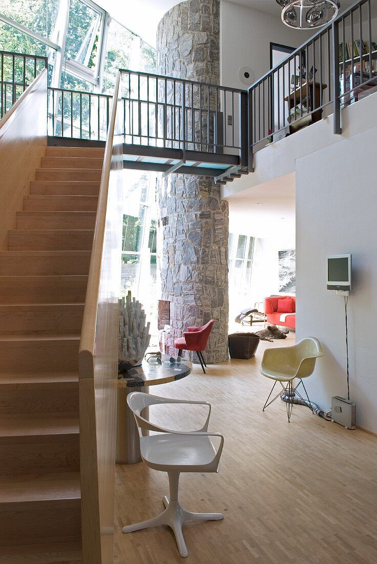 Stairs, gallery and designer furniture in architect-designed house