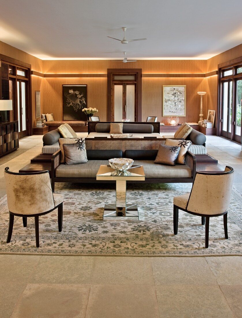 Elegant living room in shades of brown with indirect lighting