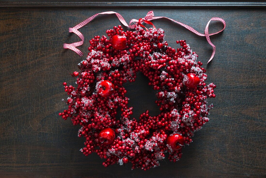 Christmas wreath of red berries and apples