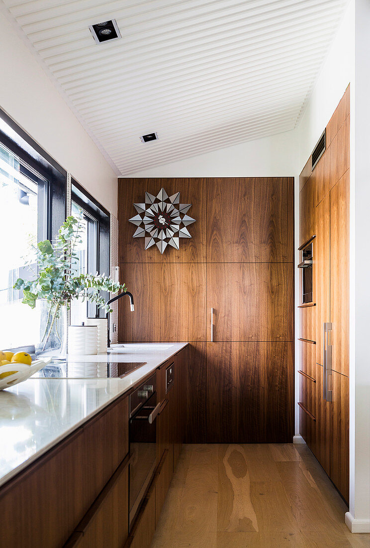 Elegant kitchen with walnut fittings