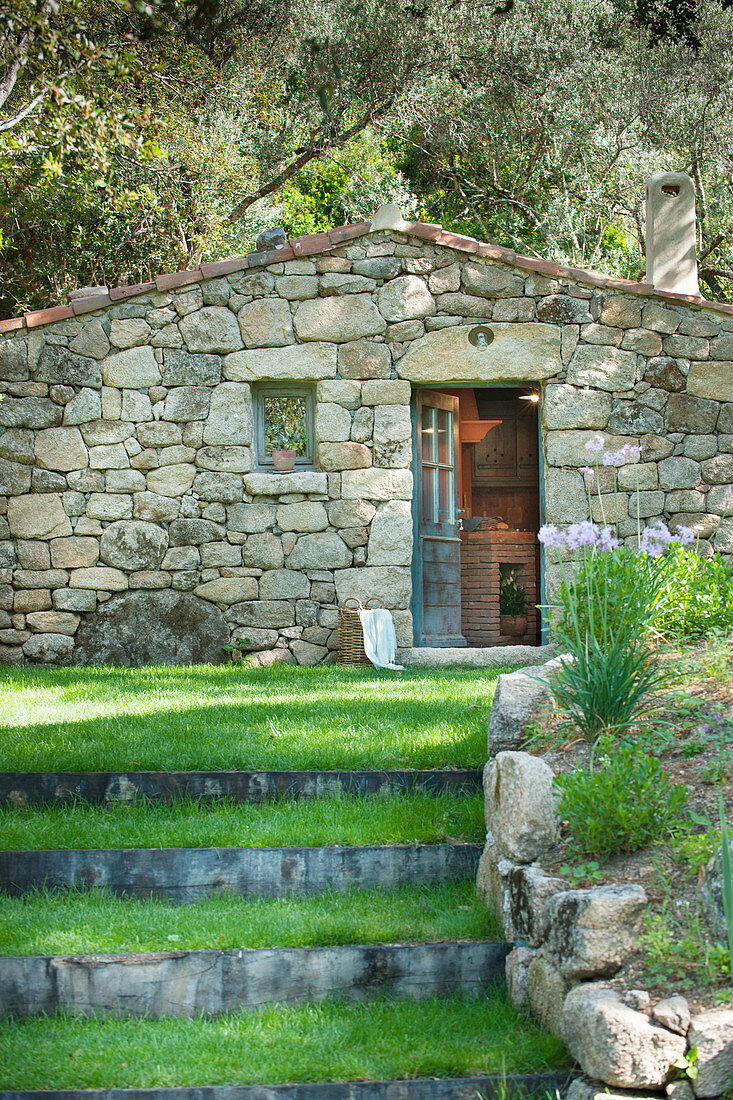 Stone house in Mediterranean landscape