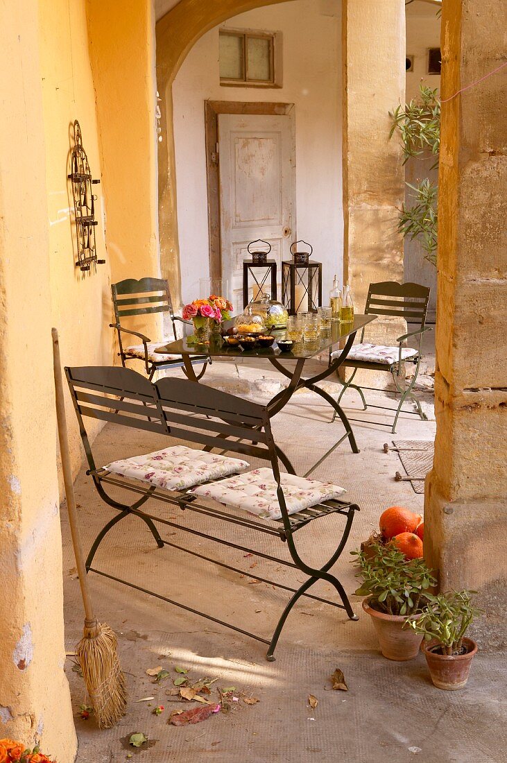 Metal furniture on Mediterranean veranda