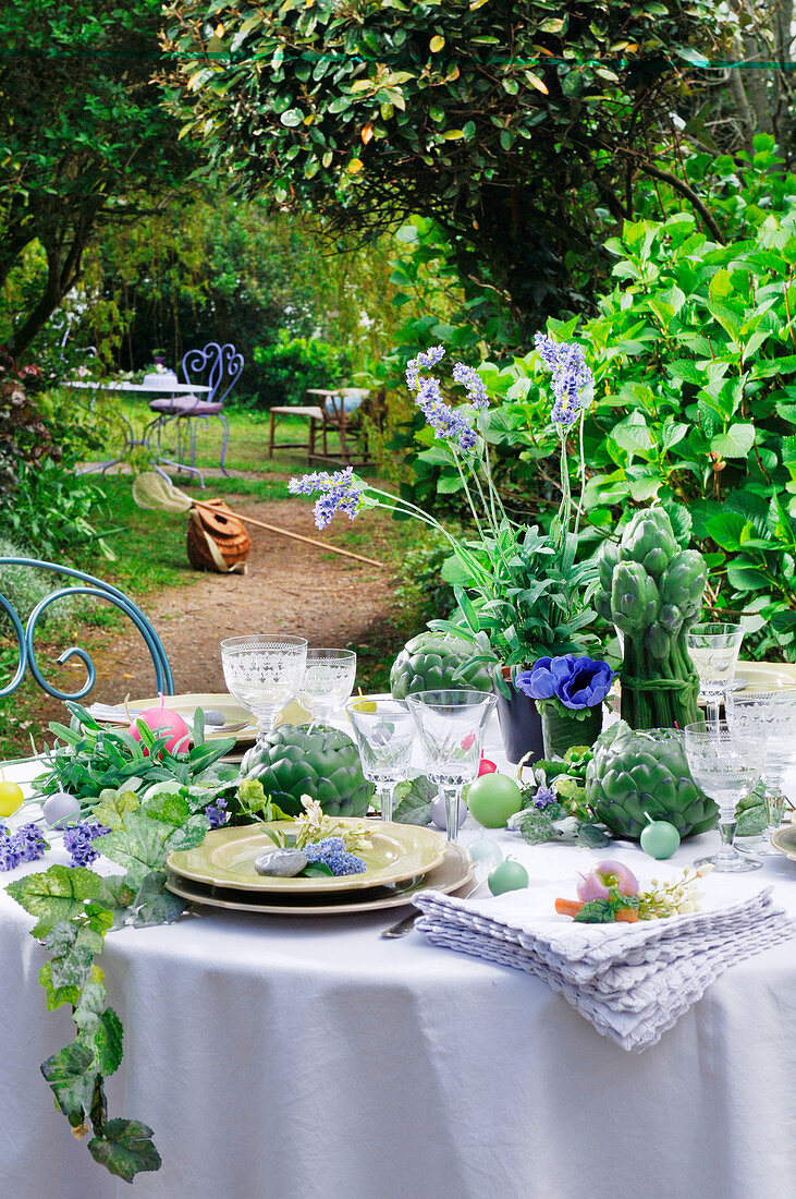 Lavishly set table in summer garden
