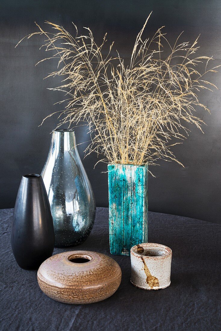 Dry grasses in seventies vases