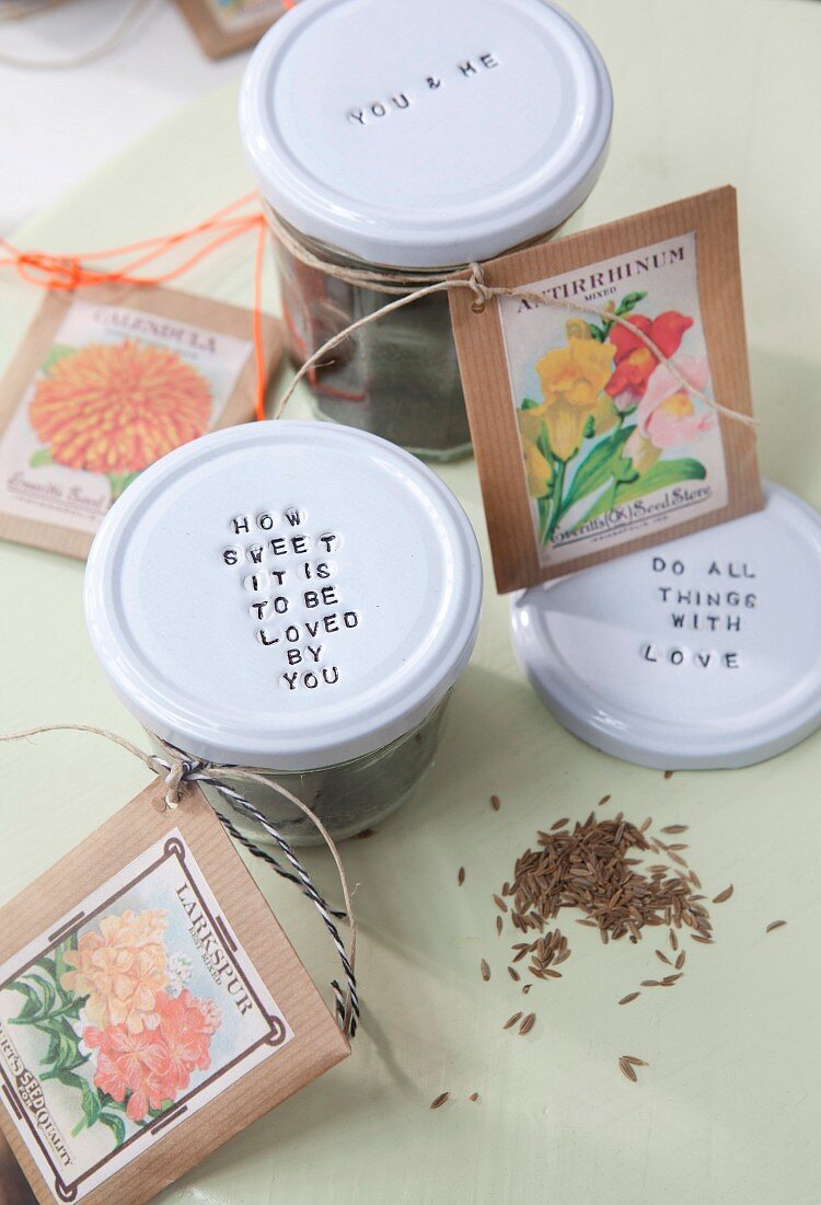 Flower seeds in screw-top jars with tags as gifts