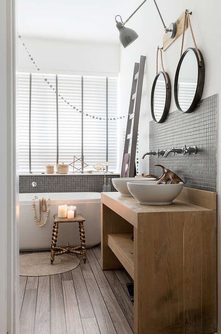 Festive decorations in rustic bathroom in natural shades