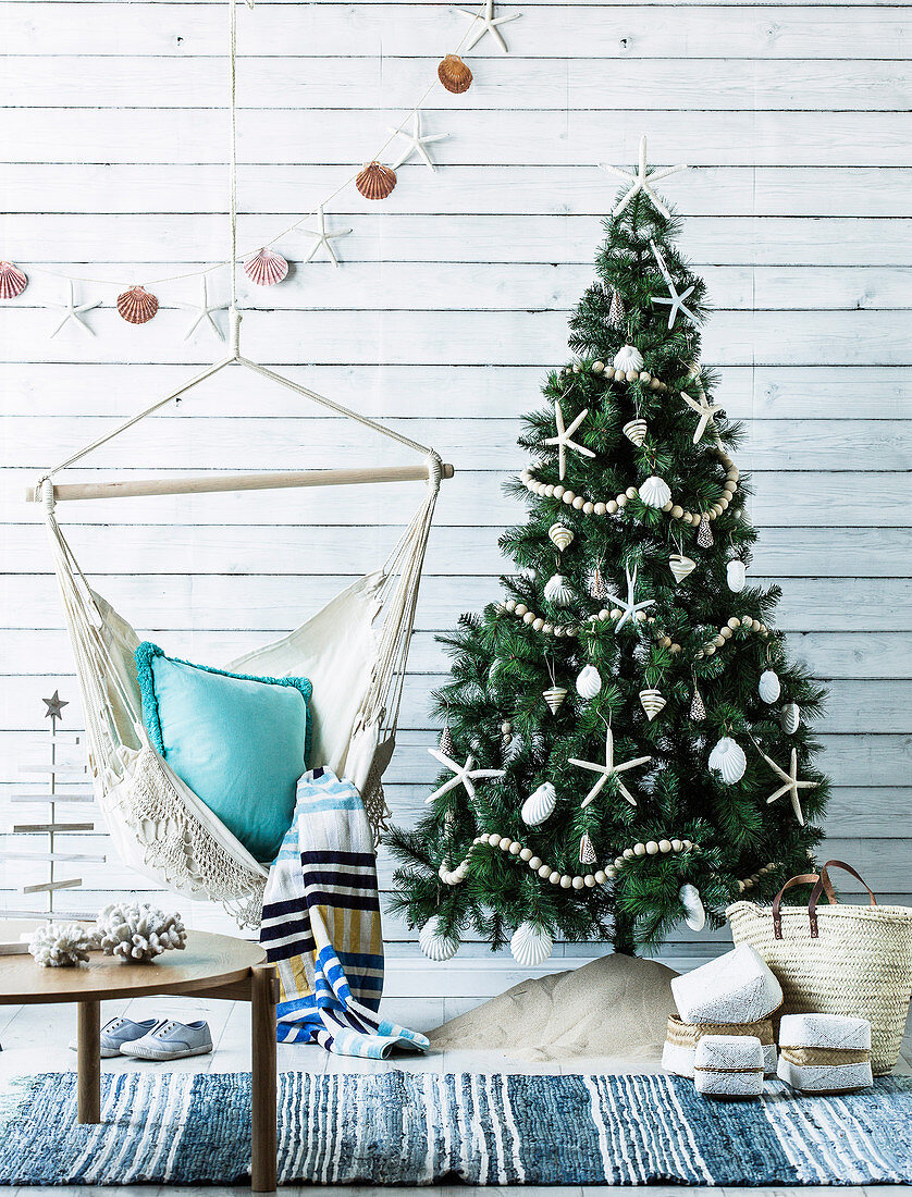 Decorated Christmas tree and hanging chair