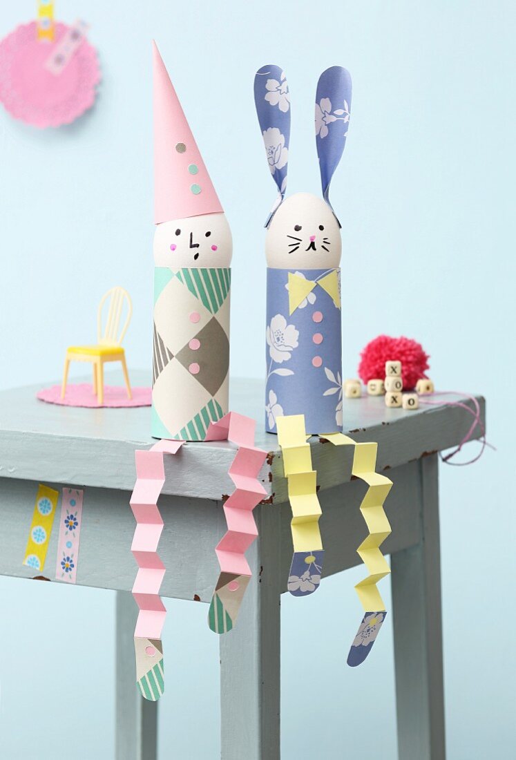 Easter bunny and clown made from eggs, toilet roll tubes and paper concertinas