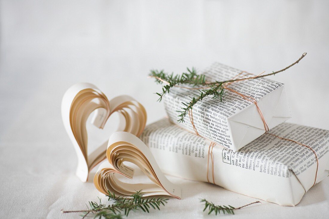 Paper hearts and gift wrapped in book pages