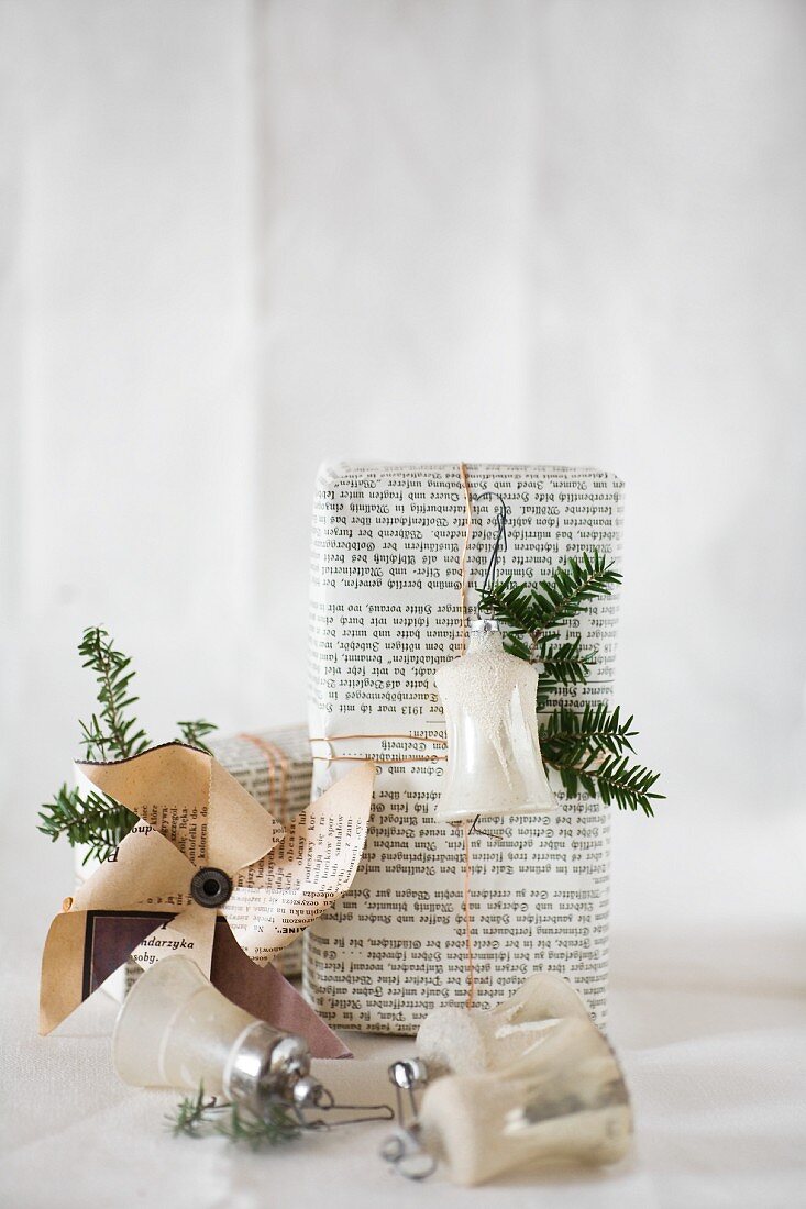 Gift wrapped in book pages and paper windmill