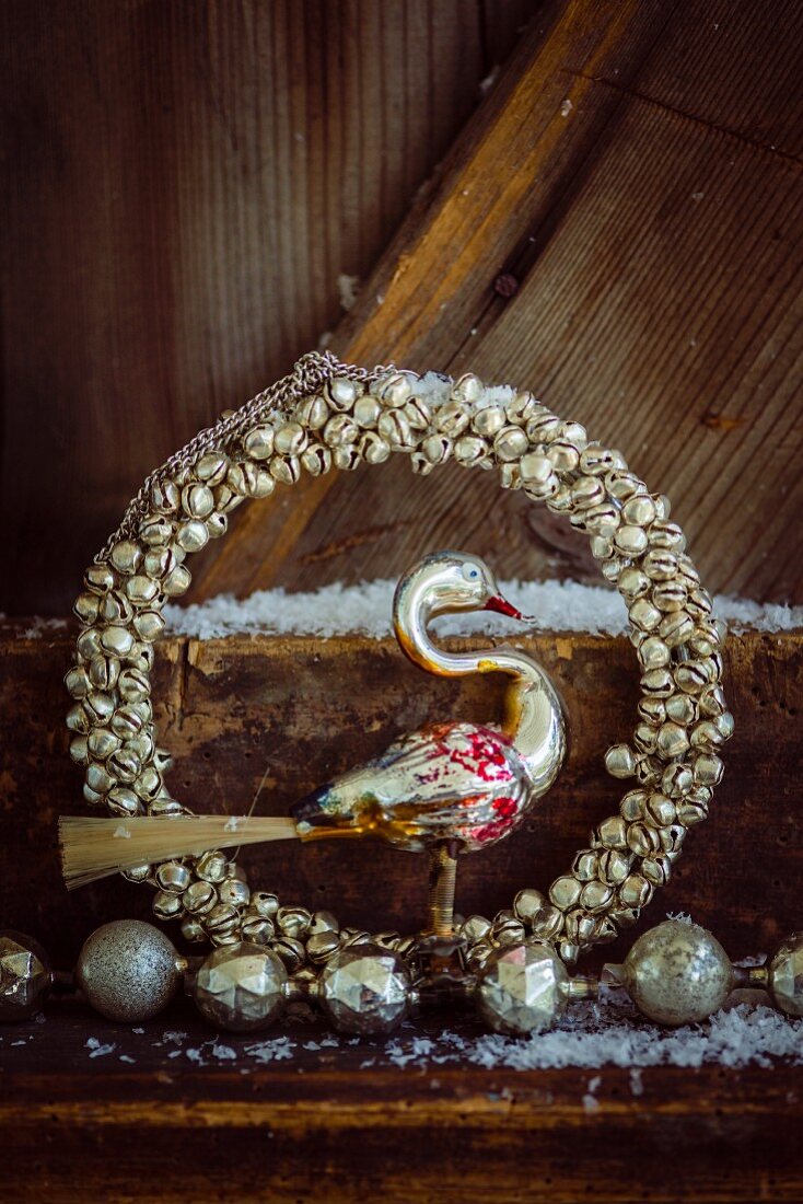 Christmas arrangement of silver wreath and swan