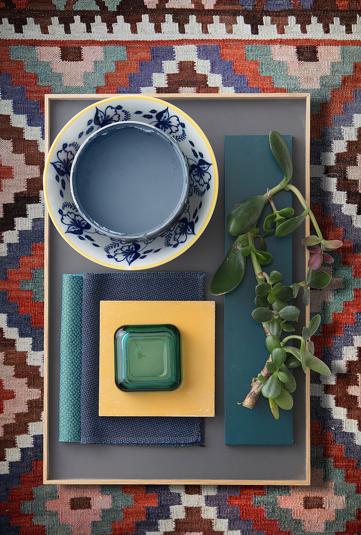 Tray of accessories on rug - ethnic-style mood board