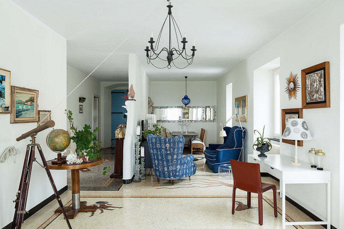 Open-plan, Italian-style interior with blue accents