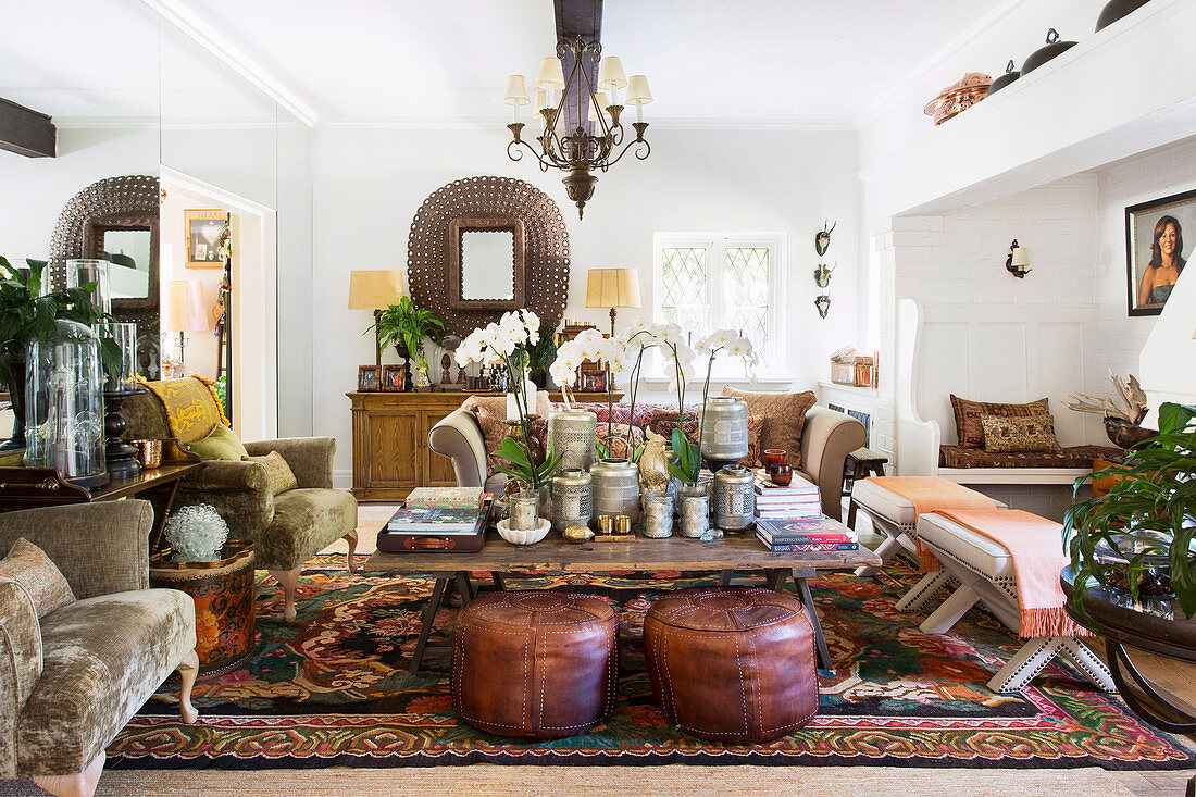 Ethnic style living room with orchids on the coffee table