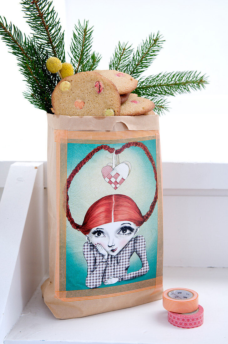 Paper bag with cookies and pine green pasted with a picture