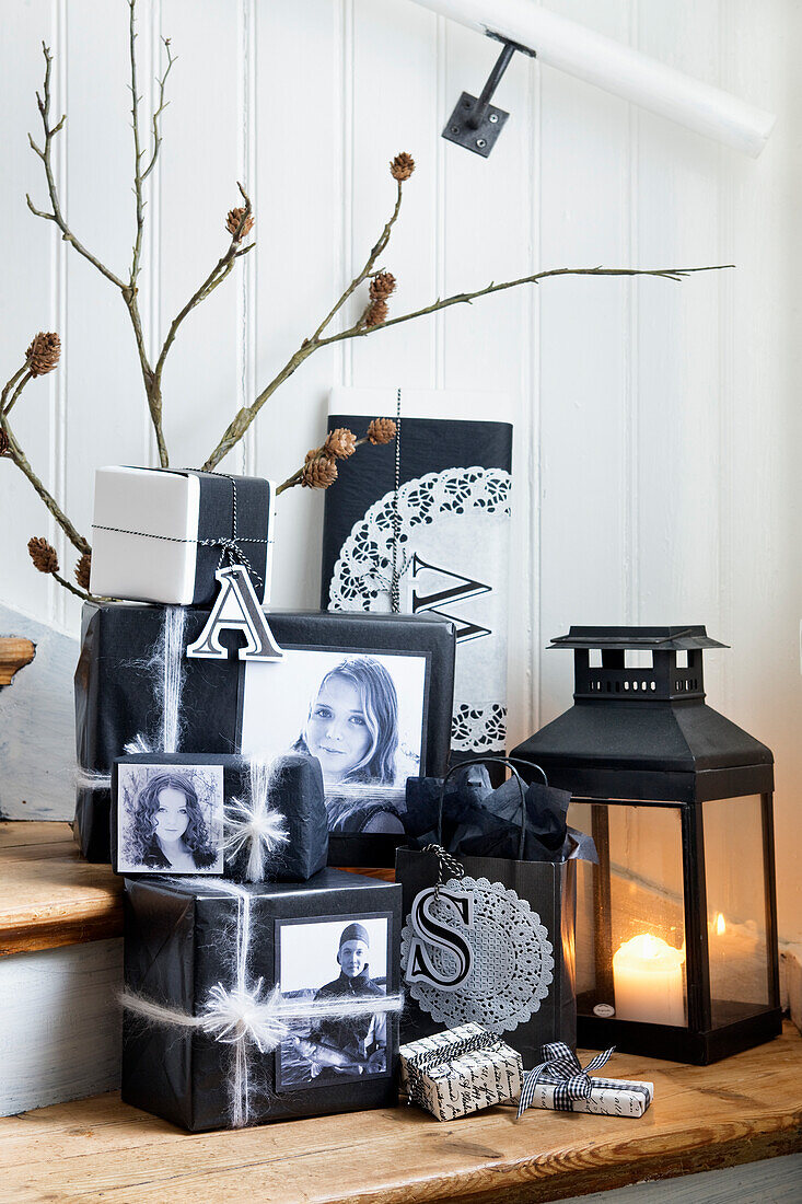 Christmas gifts wrapped and decorated with black and white photos