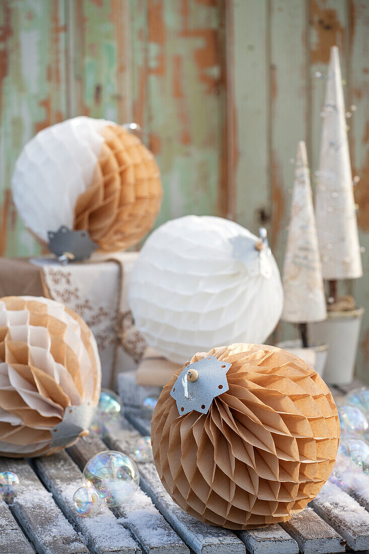 Christmas tree ornaments made from pleated accordion paper