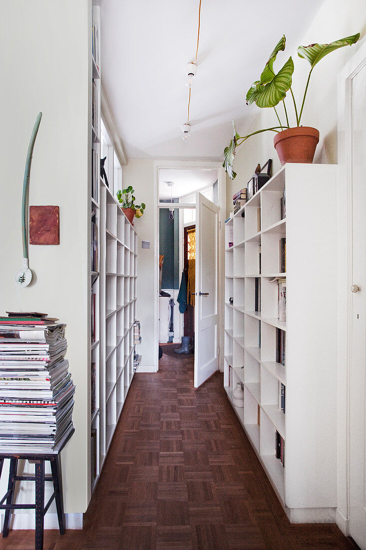 Custom-made bookshelves in the hallway