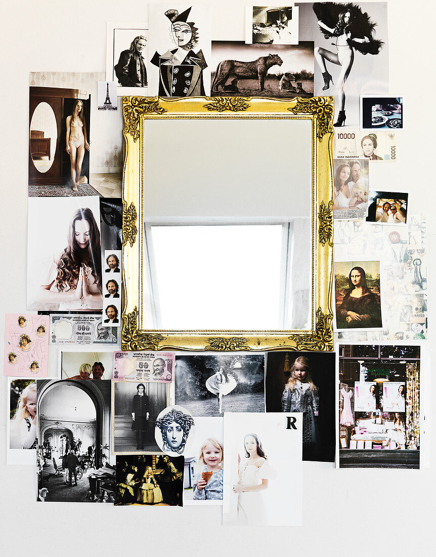 A collage around a gold-framed mirror