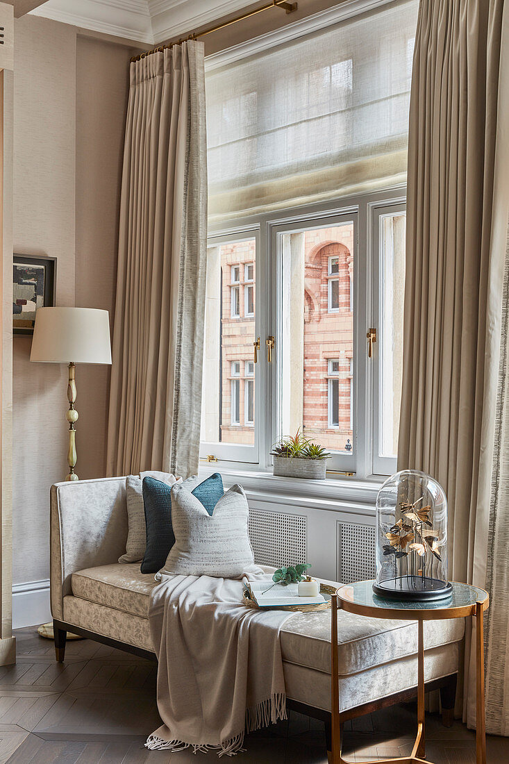 Comfortable seating area in elegant beige living room