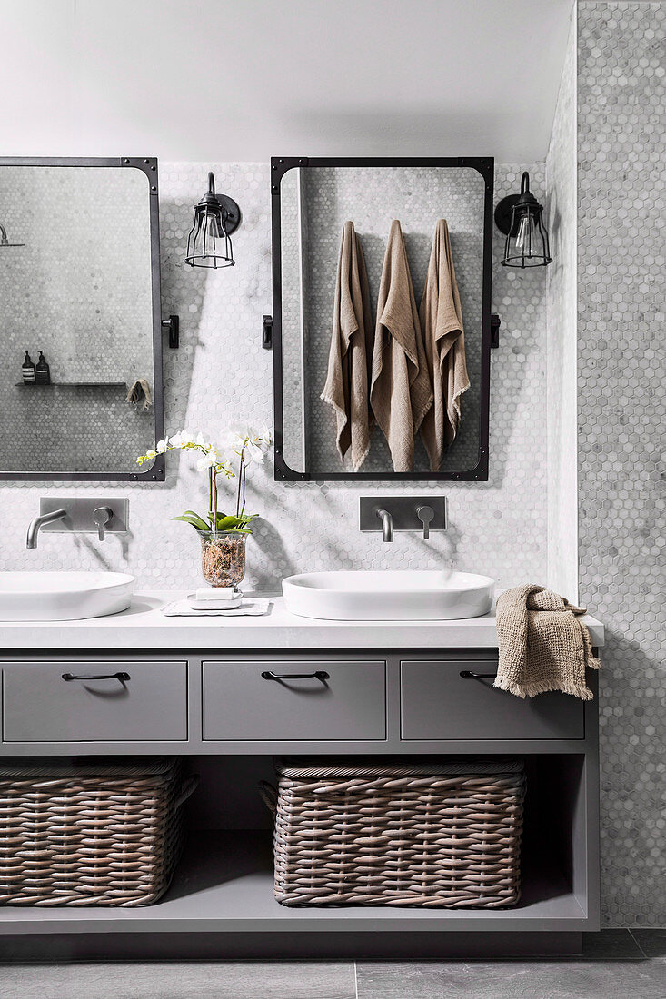 Washstand in grey with two sinks and storage baskets