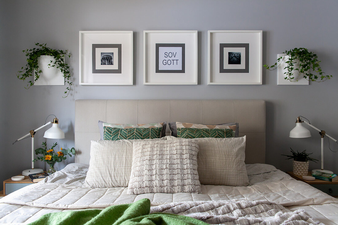 Scandinavian-style bedroom decorated in grey, white and green