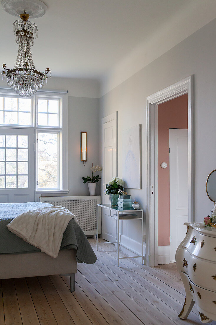 Elegant bedroom in pale grey