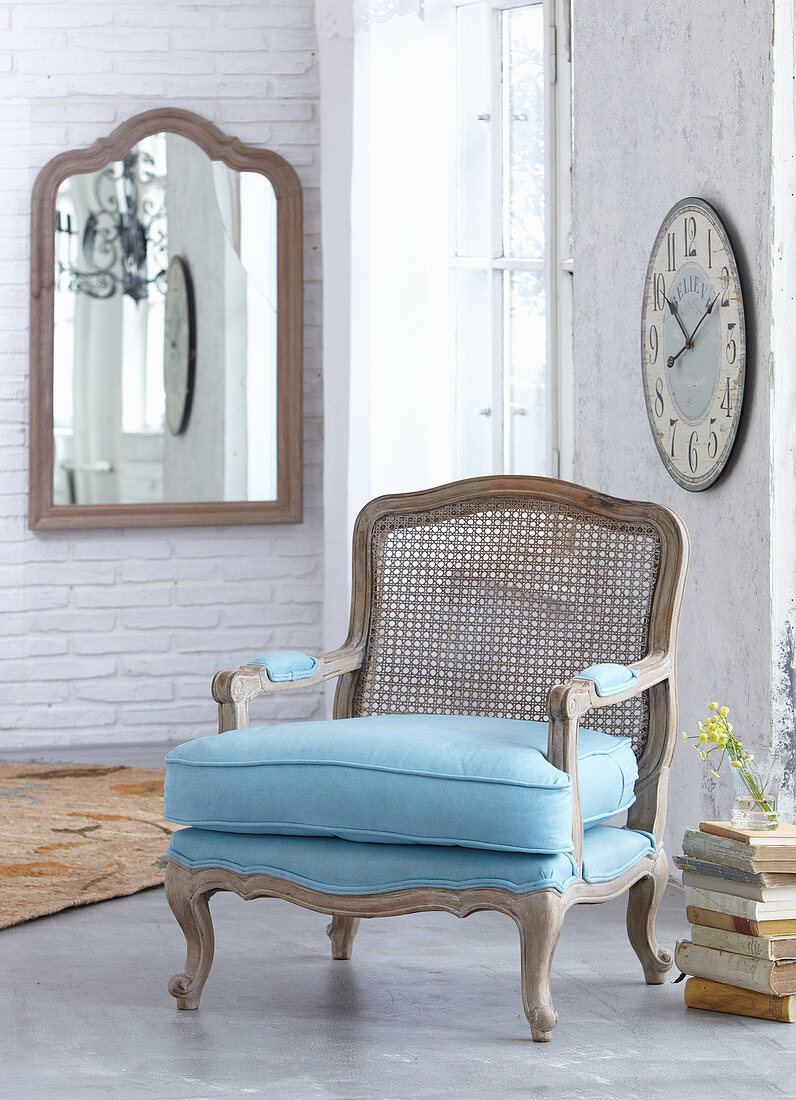 Baroque armchair with Viennese cane back and pale blue upholstery