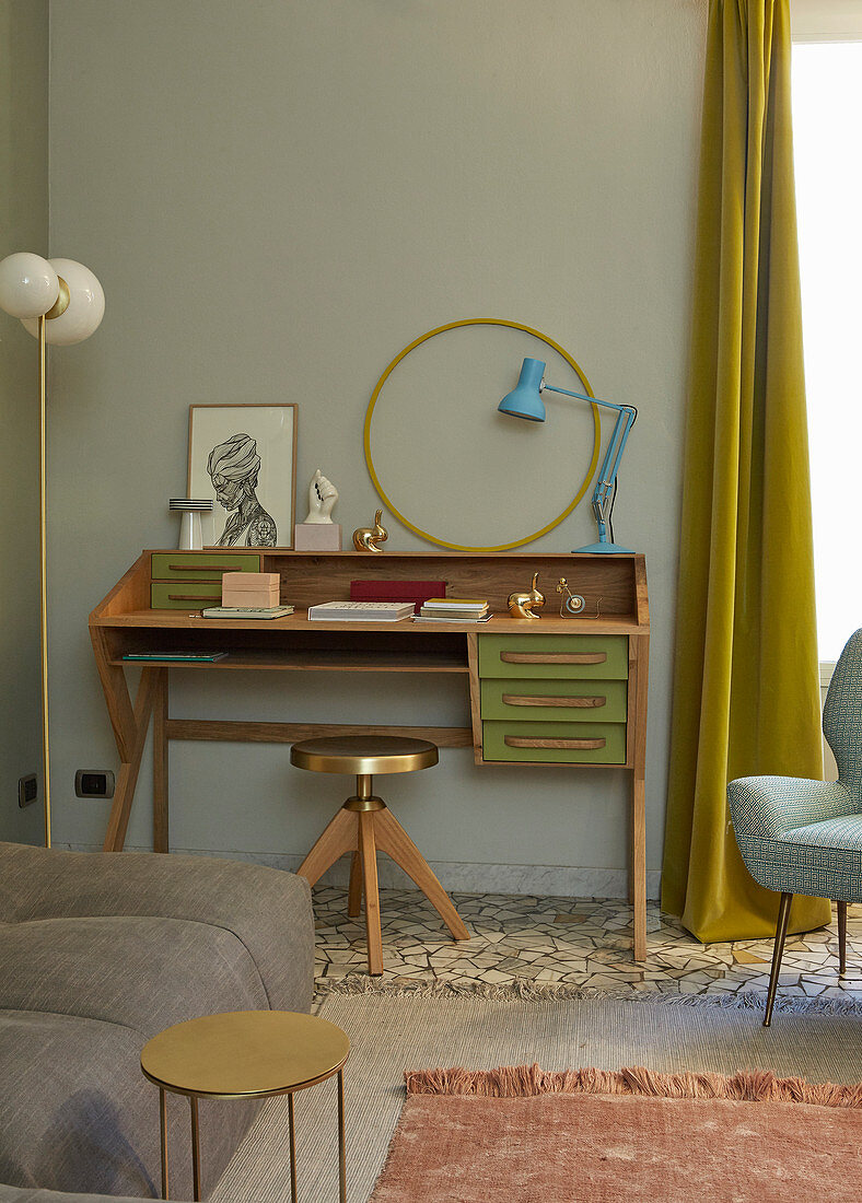 Wooden bureau, brass stool and fifties-style standard lamp with spherical lampshades