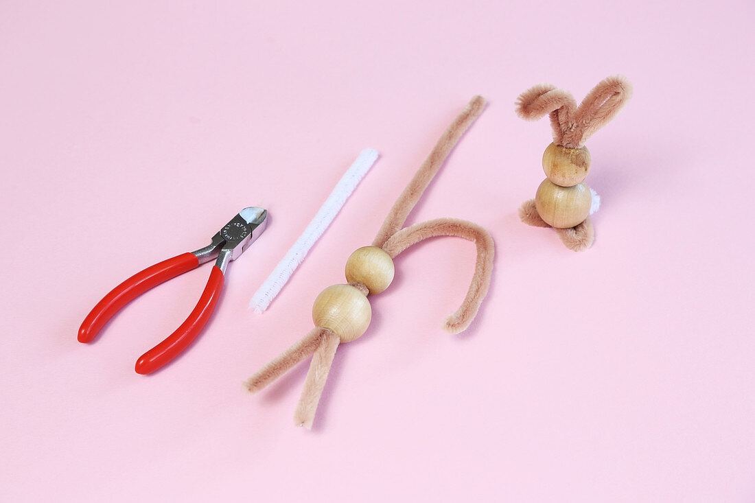 Bunnies handmade from wooden beads and utensils