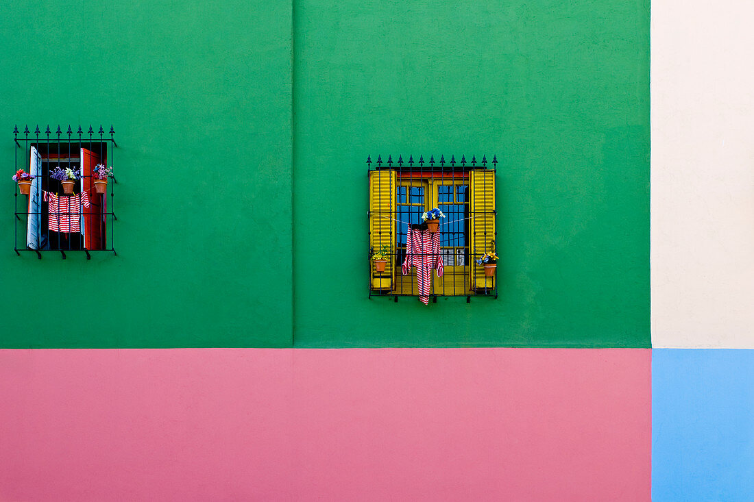 Windows in colourful external wall building