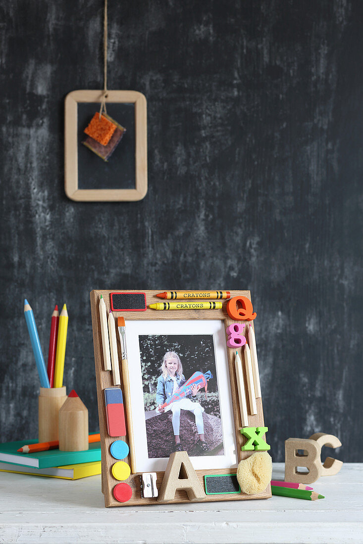 Photo of child on first day of school in hand-crafted picture frame