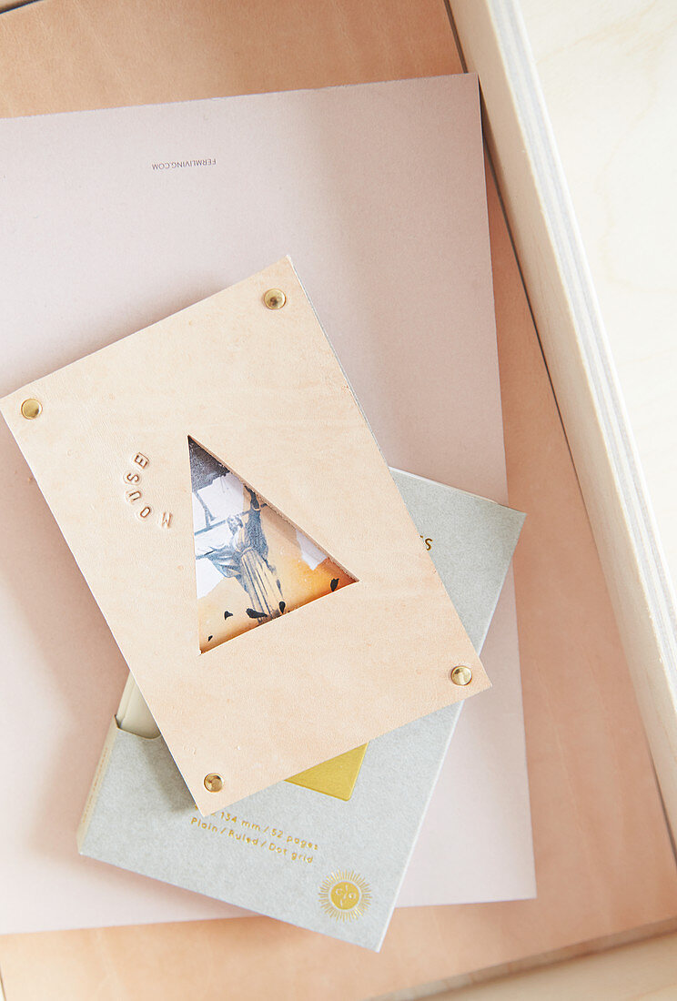 Leather picture frame with triangular opening