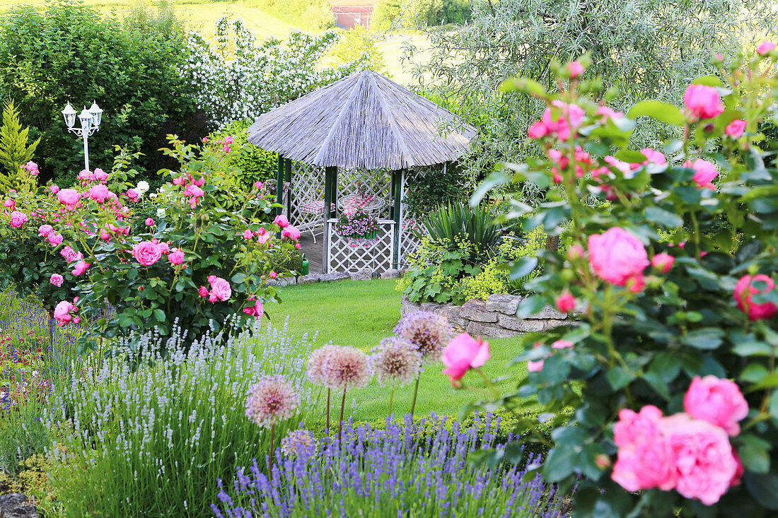 Summerhouse in rose garden