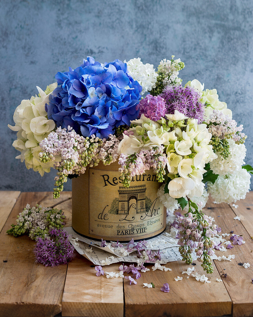 Spring bouquet with hydrangea flowers and lilacs
