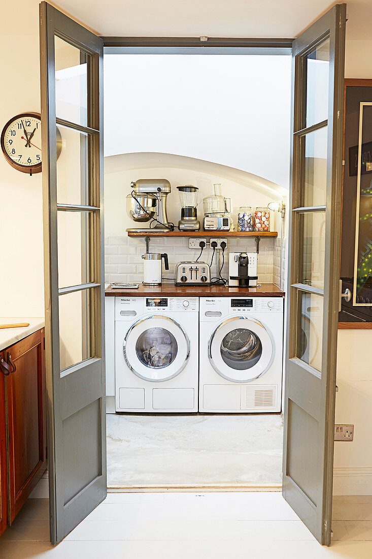 Washing machine and tumble dryer in kitchen