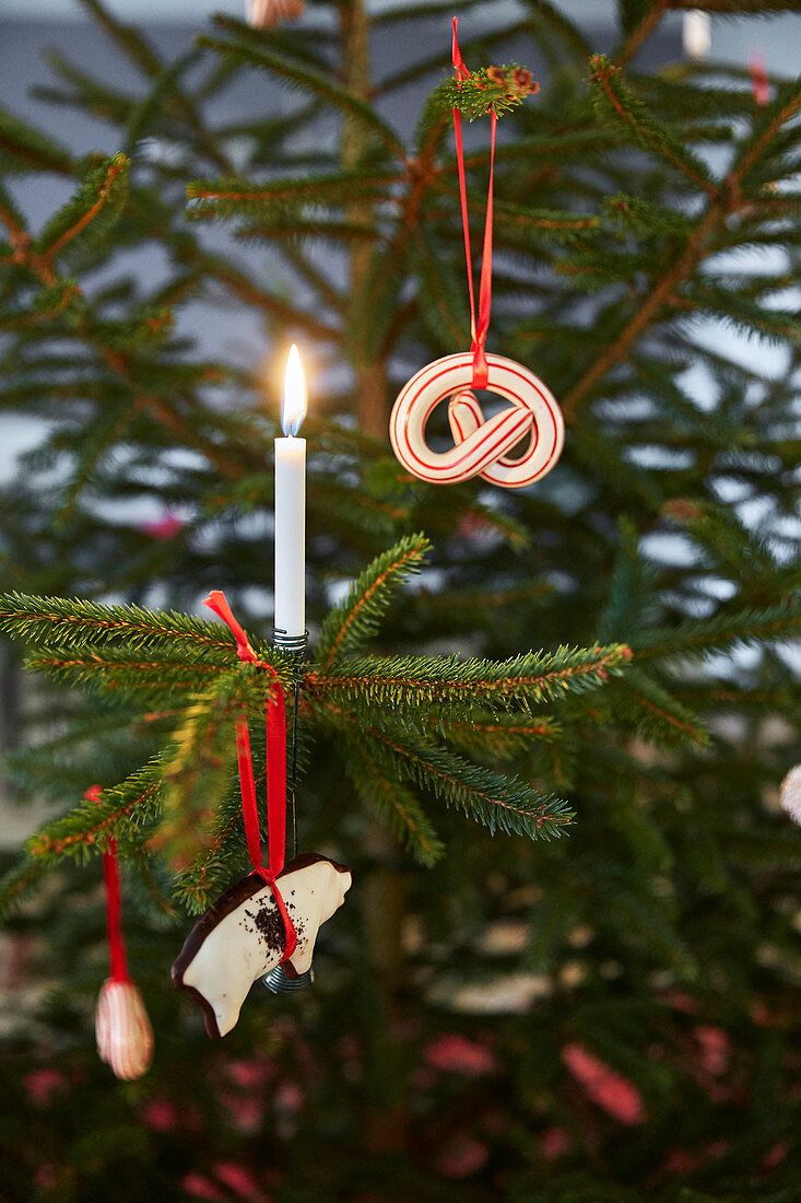 Christmas-tree decorations in shape of pretzel and pig