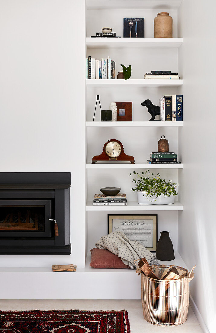 Shelves next to fireplace in living room