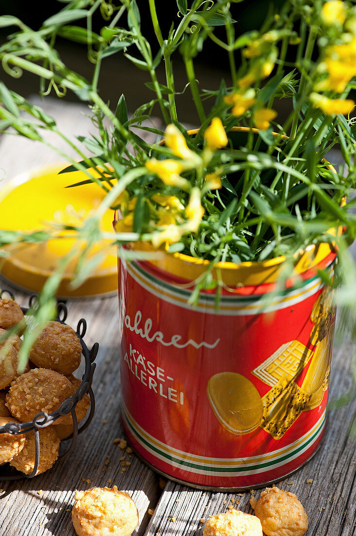 Flowers in tin