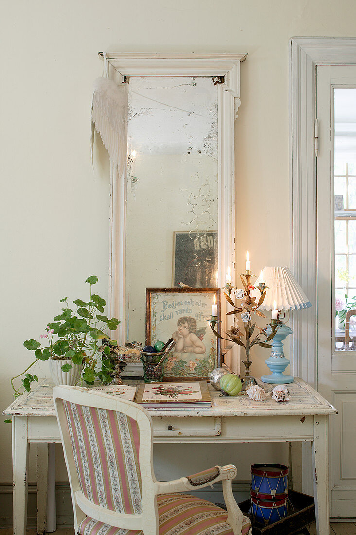 Shabby-chic desk with mirror and vintage-style ornaments