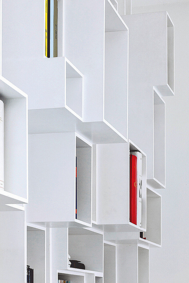 Modern, white, designer shelves with compartments of various sizes