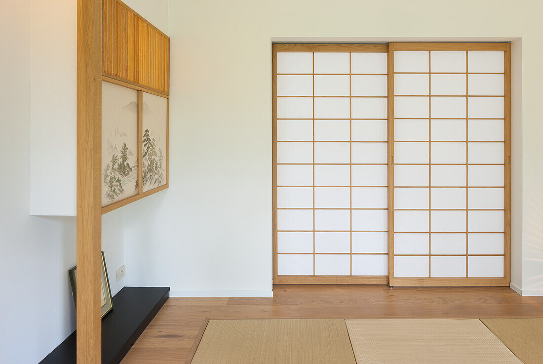 Minimalist interior with traditional Japanese shoji sliding doors and wooden details