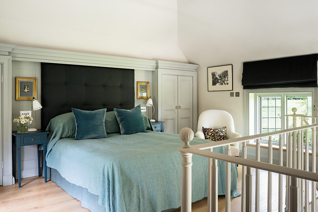 Blue bed in classic bedroom on gallery