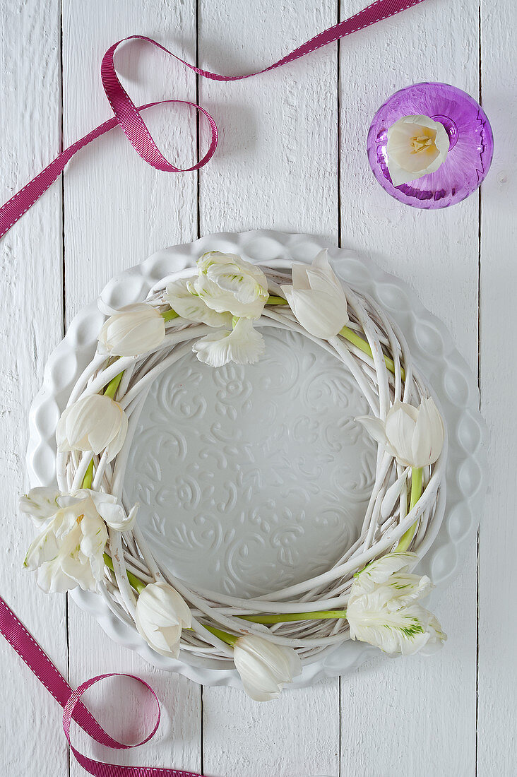White tulips in willow wreath
