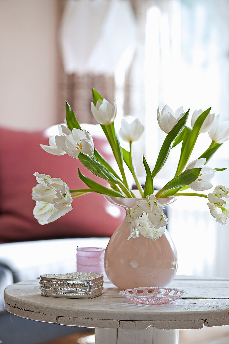 Vase of white tulips