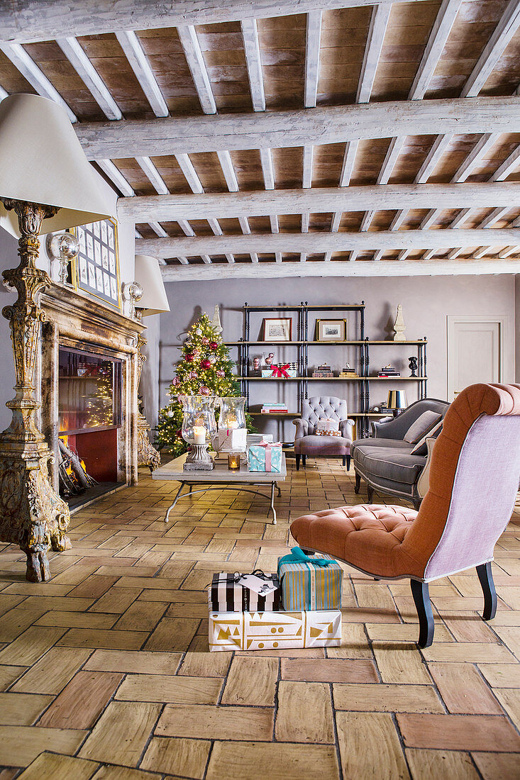 Living room in renovated farmhouse decorated for Christmas
