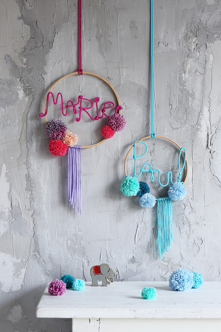 Handmade wreaths with names and pompoms