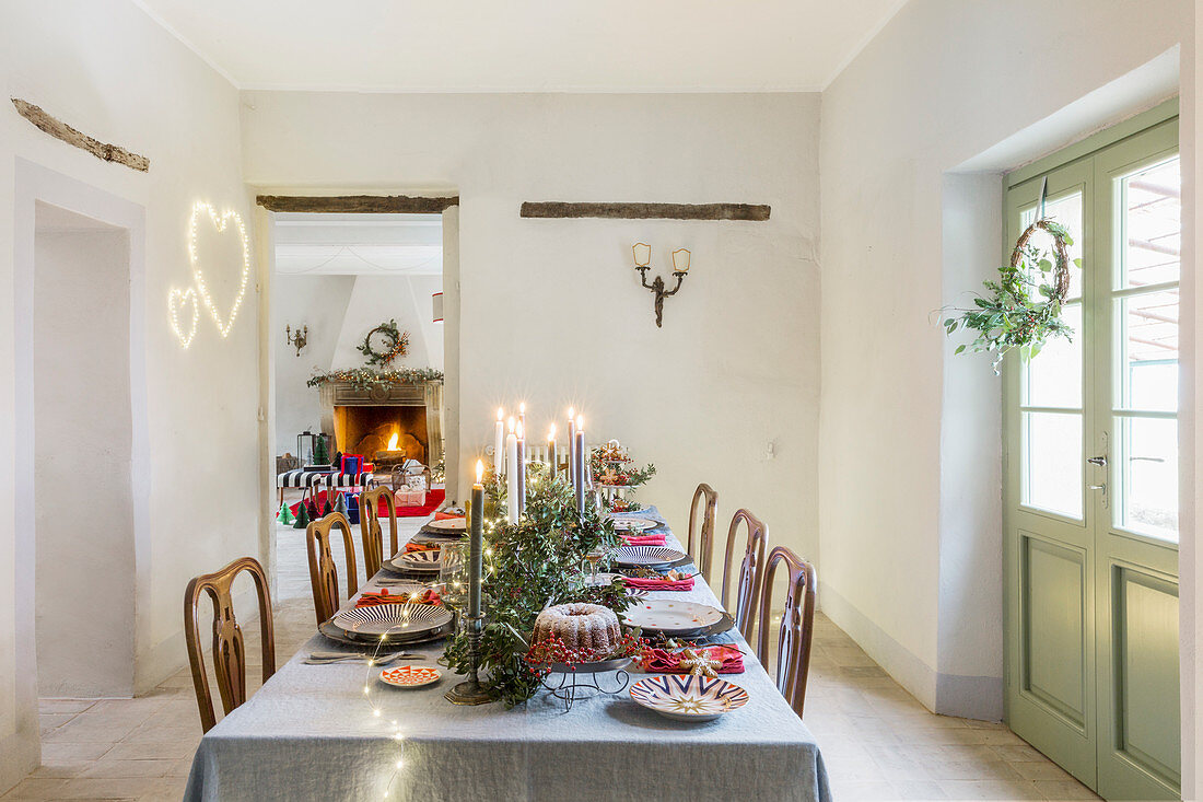 Festively set Christmas table in country house